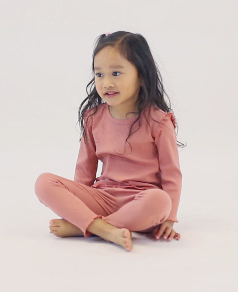 
            
                Load and play video in Gallery viewer, Ruffled Rib Knit Long Sleeve Top - Coral Pink
            
        